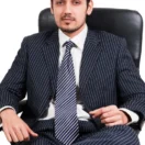 depositphotos_8454123-stock-photo-confident-businessman-sitting-on-office (1)